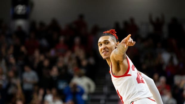 Cincinnati Bearcats guard Jeremiah Davenport (24) celebrates after making a three-point shot during the second half of an NCAA men s college basketball game on Saturday, Feb. 11, 2023 at Fifth Third Arena in Cincinnati. The Bearcats defeated the South Florida Bulls 84-65. South Florida Bulls At Cincinnati Bearcats Ncaa Basketball Feb 11